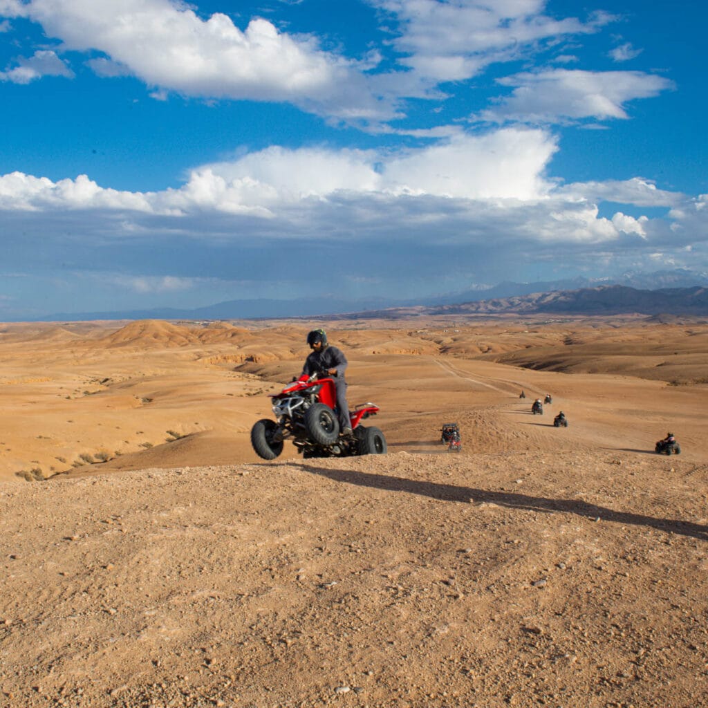 Quad Marrakech for beginners riding safely on Agafay Desert trail with guide